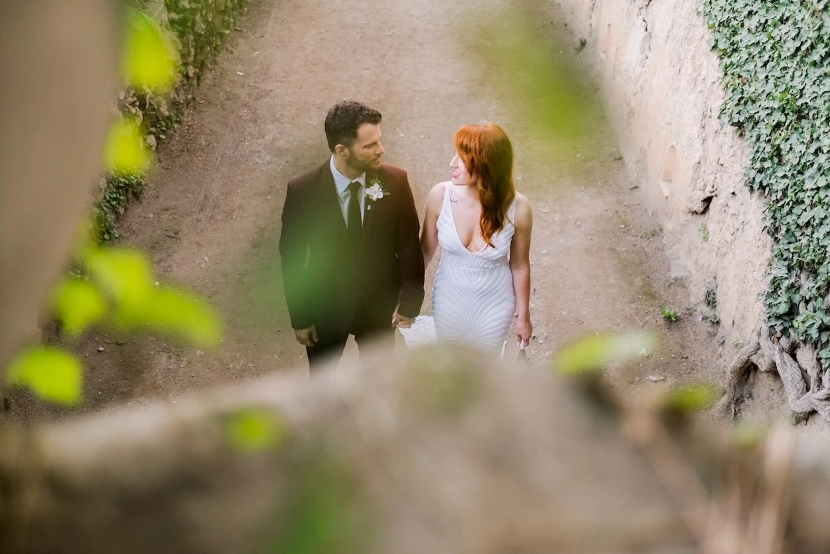 A newlywed couple in the gardens of Villa Cimbrone in Ravello on the Amalfi Coast
