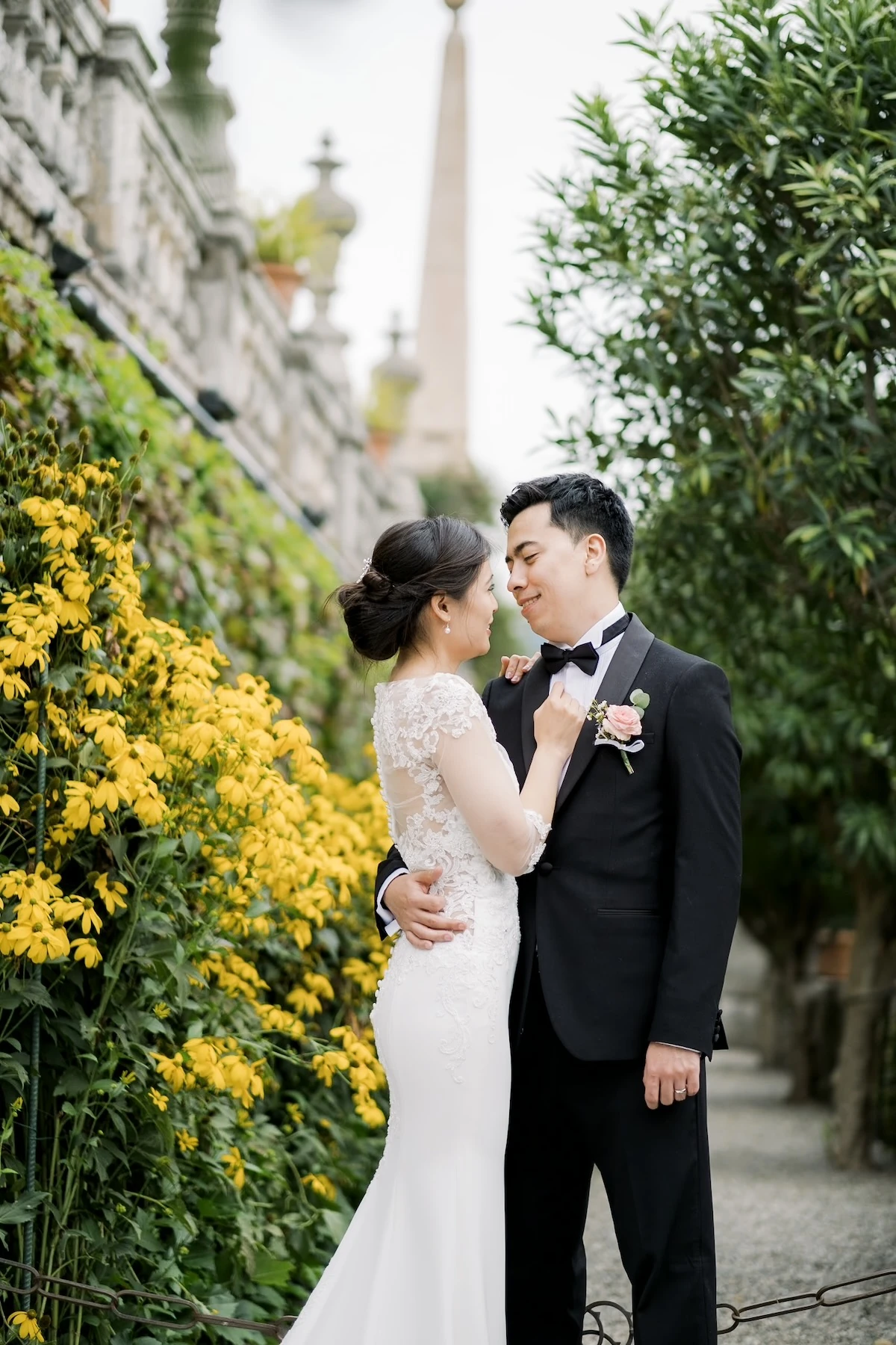 Lake Maggiore twp newlyweds embracing each other